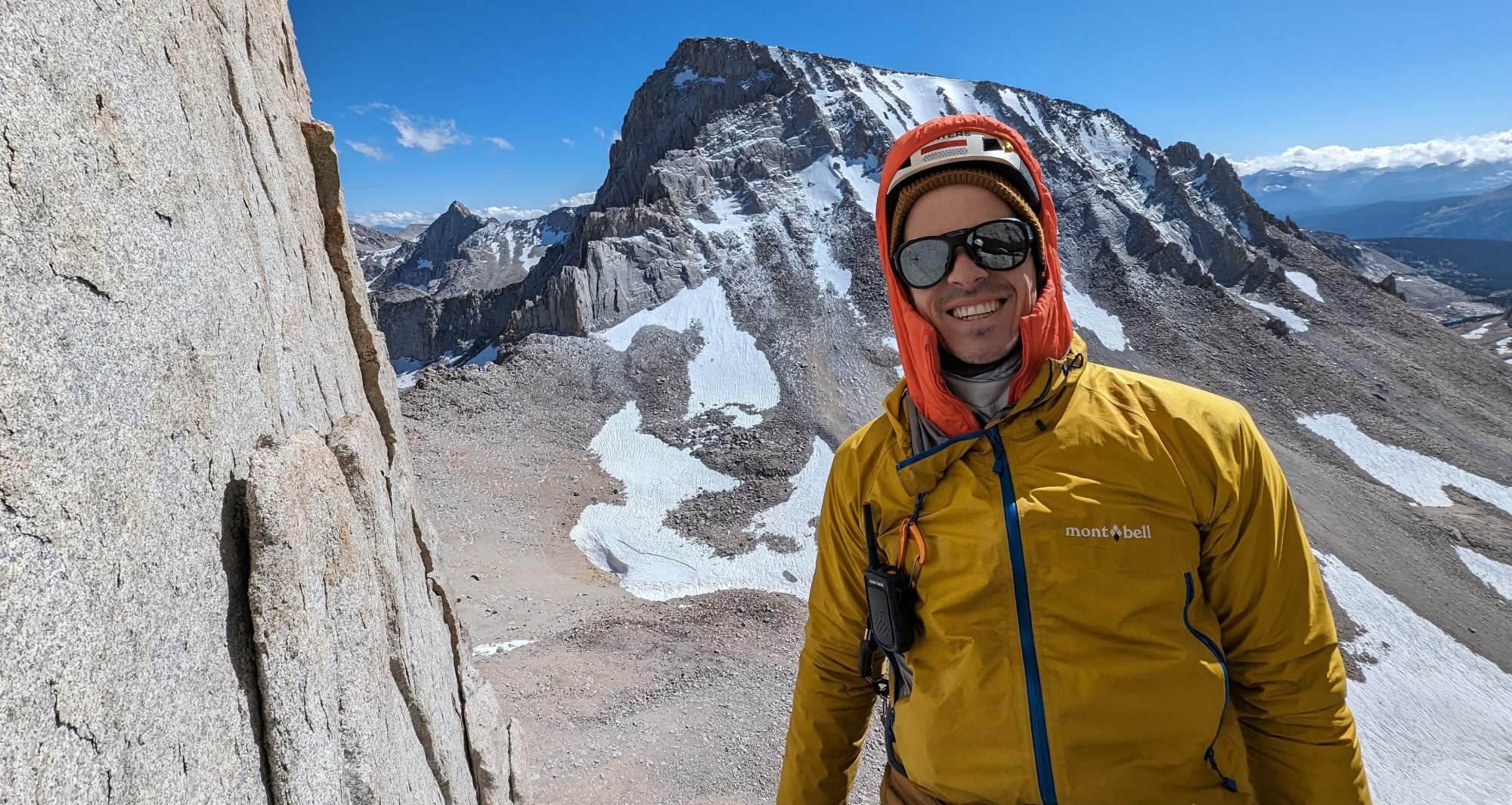 a picture of Philipp Arndt enjoying the warmth of the sun on the rock climb Mithril Dihedral, Mt. Russell, California